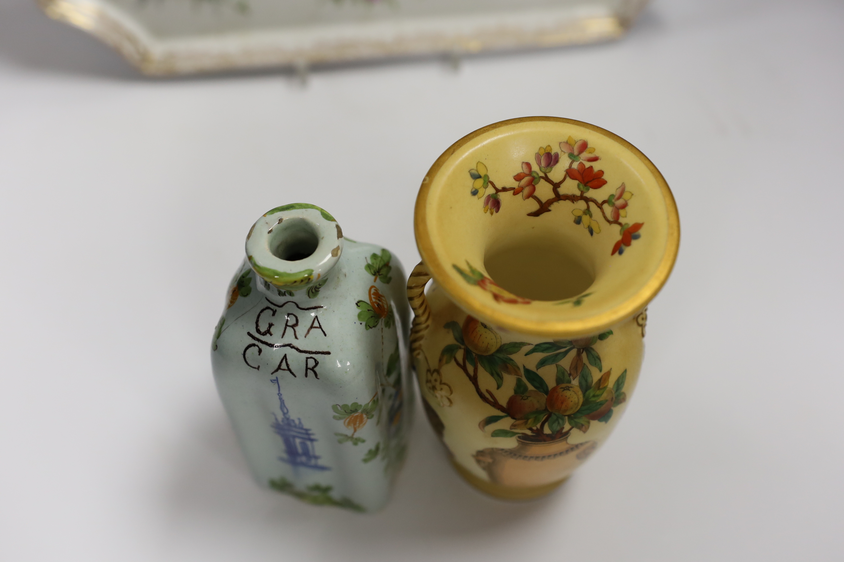 A Dresden porcelain floral dish, Cantagalli caddy and three Paris vases, largest 33cm wide